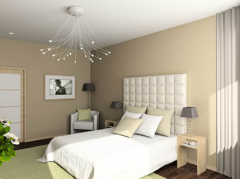 Modern bedroom with white bedboard hanging light