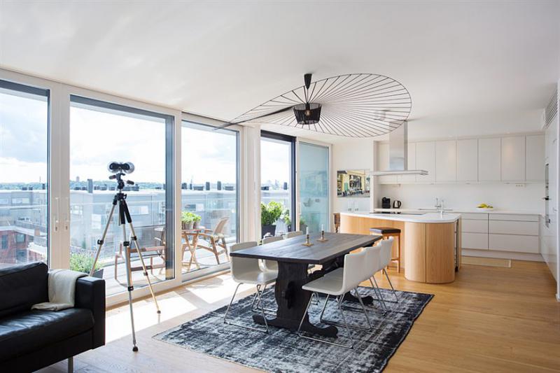 Дизайн кухни-гостиной площадью 40 кв м с панорамным окном