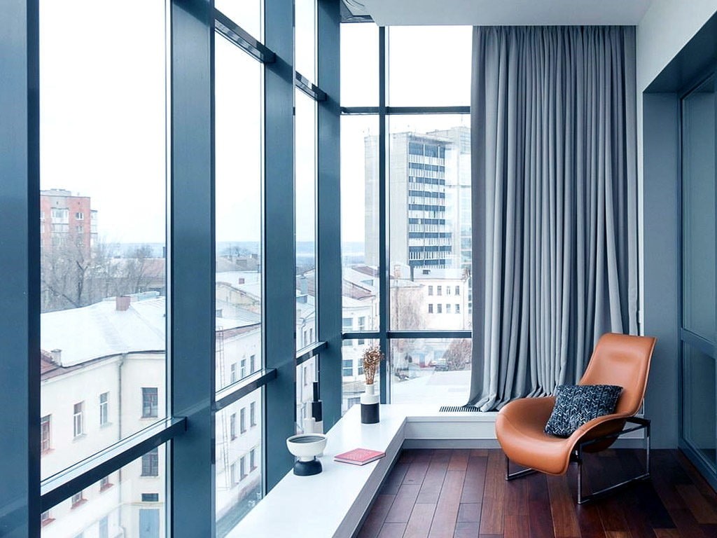 Алюминиевое панорамное остекление балкона в квартире