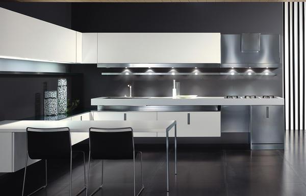 На кухне, выполненной в стиле хай-тек, размещают  функциональную мебель строгих геометрических форм, содержащую  элементы из стекла и металла