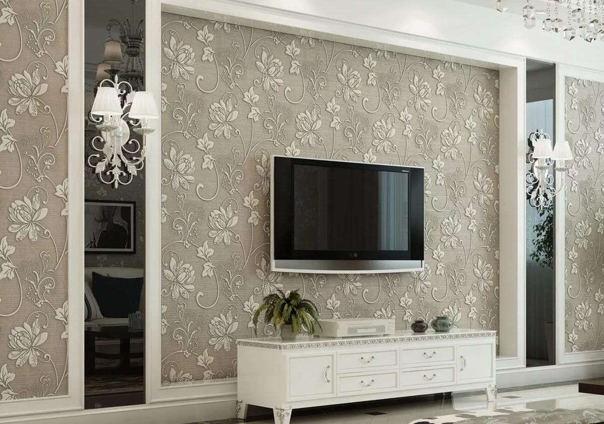 Выбирать высоту для размещения телевизора следует в зависимости от размеров комнаты и расположения дивана 